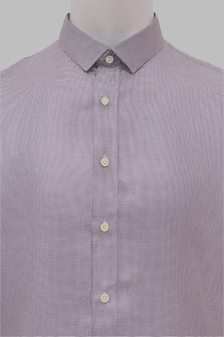 Purple checkered shirt on a mannequin with a gray background